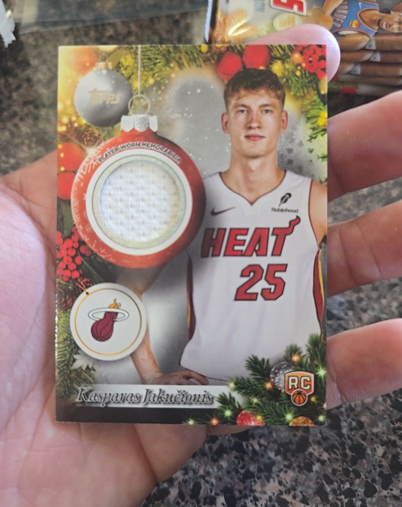 2025-26 Topps Holiday Basketball Kasparas Jakucionis Jersey Relic RC Miami Heat — front