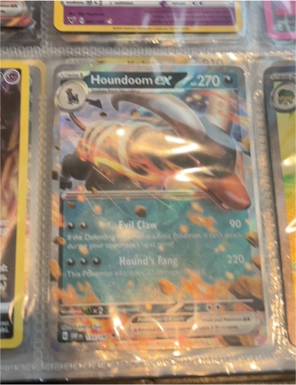 2023 Pokémon TCG Obsidian Flames #134 Houndoom ex — front