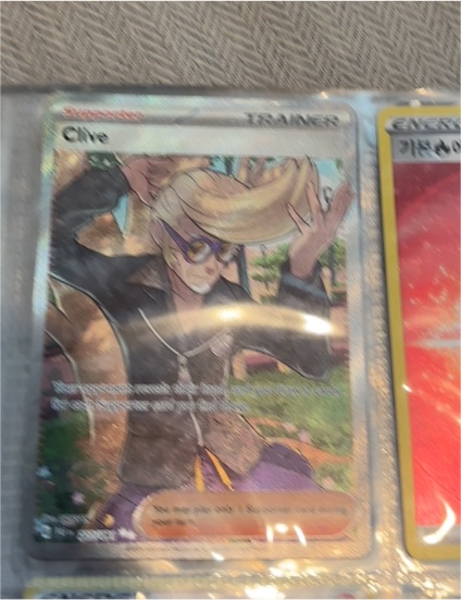 2024 Pokémon TCG Scarlet & Violet: Paldean Fates #227 Clive — front