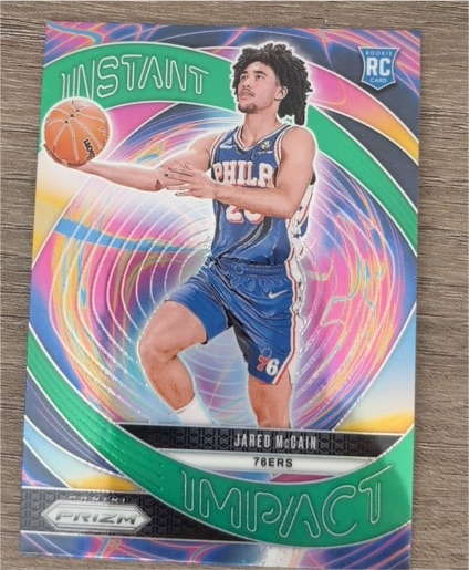 2024-25 Panini Prizm #10 Jared McCain Instant Impact Green Prizm Rookie Card — front