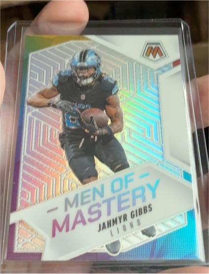 2025 Panini Mosaic Men of Mastery #Jahmyr Gibbs — front