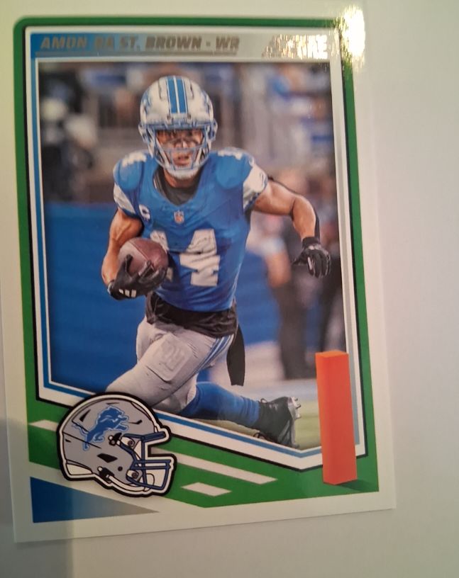 2025 Panini Score #142 Amon-Ra St. Brown — front