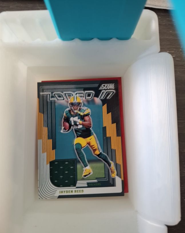 2025 Panini Score Zoned In Jayden Reed Jersey Patch #ZON-JRD — front
