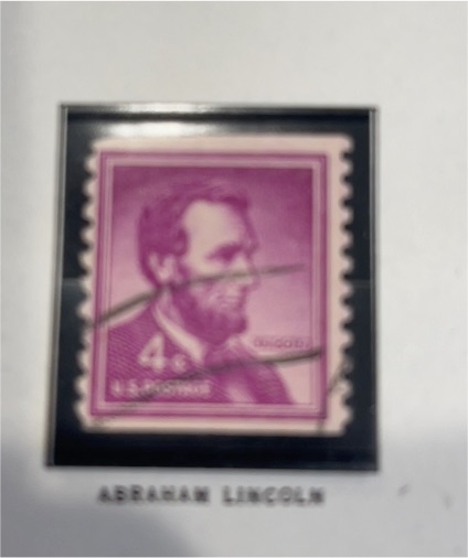 1954 USPS 4 Cent Abraham Lincoln Purple Stamp — front