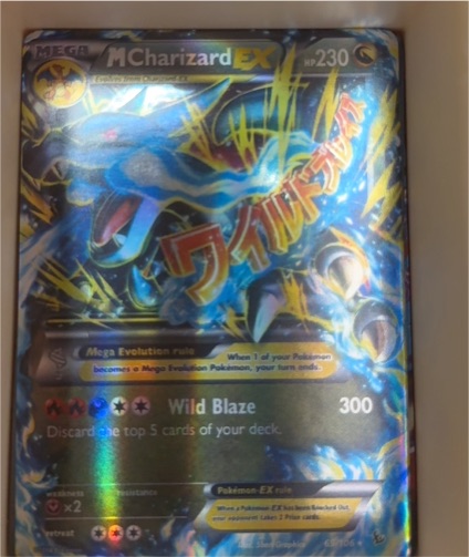 2014 Pokémon #55 Mega M Charizard EX Wild Blaze — front