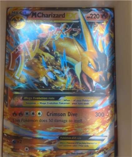 2014 Pokémon TCG Mega Charizard EX #13/108 — front