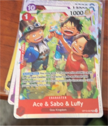 2025 One Piece TCG OP13-007 Ace & Sabo & Luffy Carrying On His Will — front