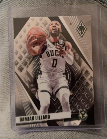 2023-24 Panini Phoenix #79 Damian Lillard Milwaukee Bucks — front
