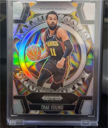 2024-25 Panini Prizm Black #12 Trae Young Kaleidoscopic Silver Prizm Atlanta Hawks — front