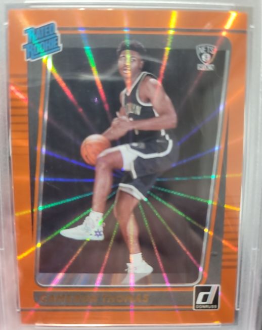 2021-22 Donruss #203 Cameron Thomas Orange Laser Rated Rookie — front