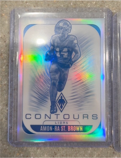 2025 Panini Phoenix Contours Amon-Ra St. Brown — front