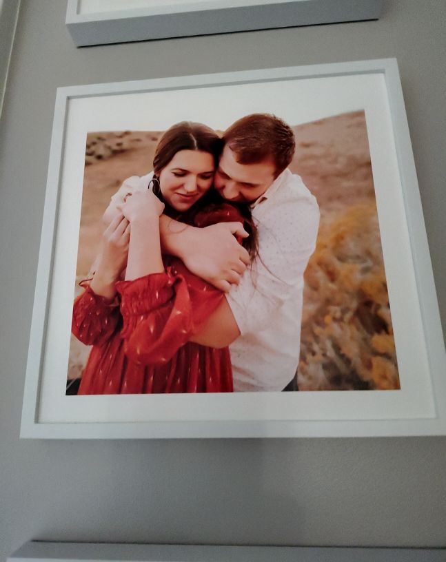 Framed Photo of Couple Hugging — front