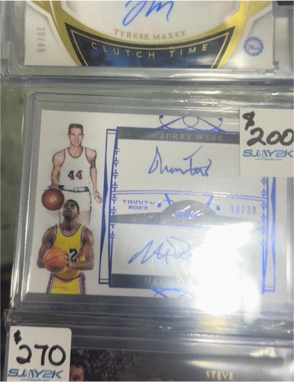 2023 Leaf Trinity #DA-17 Jerry West / Magic Johnson Dual Auto Holo Silver /49 — front