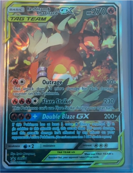 2019 Pokémon Sun & Moon #SM201 Reshiram & Charizard GX — front