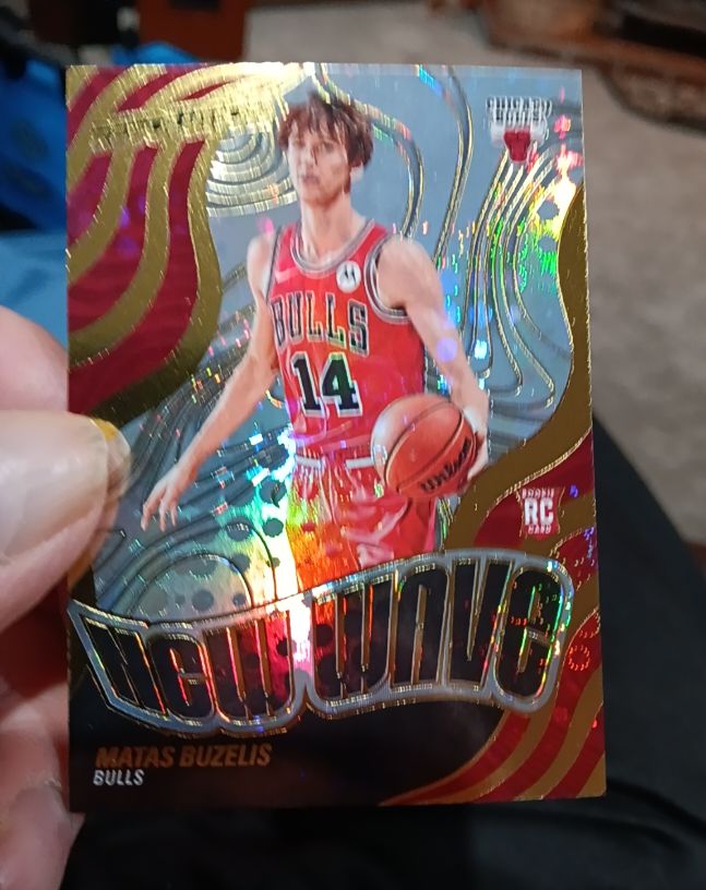 2024-25 Panini Revolution #129 Matas Buzelis RC Rookie Storm & New Wave — front