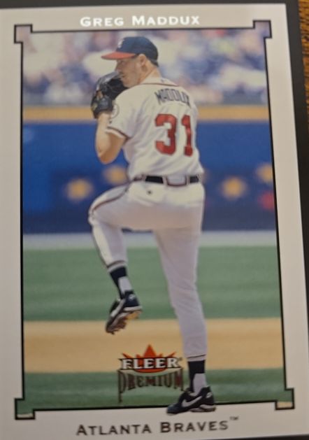 2002 Fleer Premium #166 Greg Maddux — front