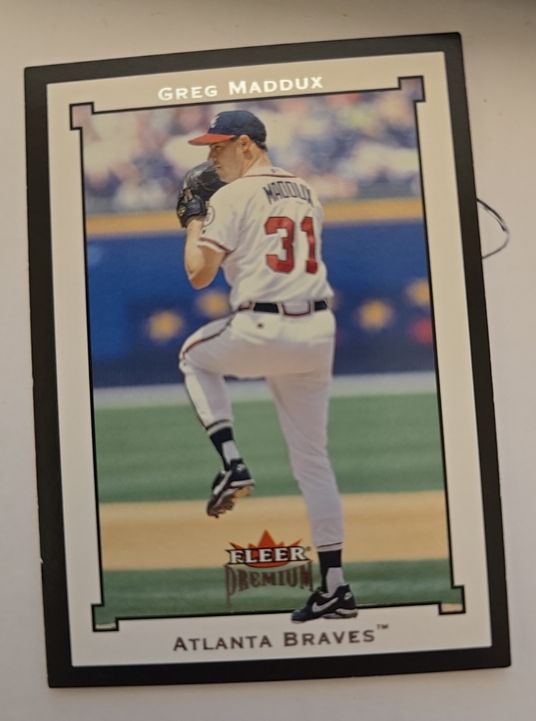 2002 Fleer Premium #166 Greg Maddux — front