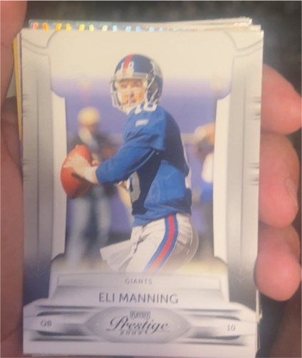 2009 Playoff Prestige #63 Eli Manning — front