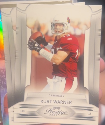 2009 Playoff Prestige #1 Kurt Warner — front