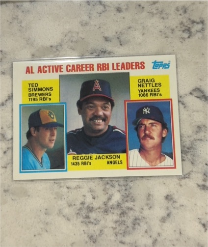 1984 Topps #713 AL Active Career RBI Leaders Reggie Jackson — front