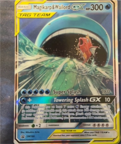 2017 Pokémon SM Black Star Promo #SM166 Magikarp & Wailord GX — front