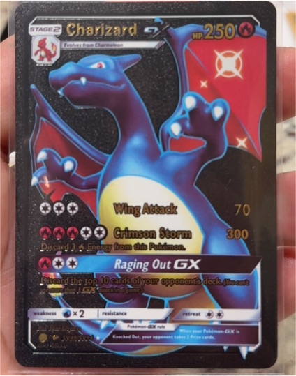 Pokémon TCG Hidden Fates #SV49 Charizard GX — front