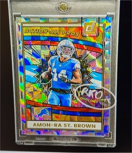 2025 Panini Donruss Action-All Pros #AAP-AST Amon-Ra St. Brown — front