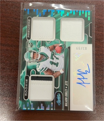 2024 Panini Absolute Rookie Premiere Materials Autographs #RPM-MCY Malachi Corley — front