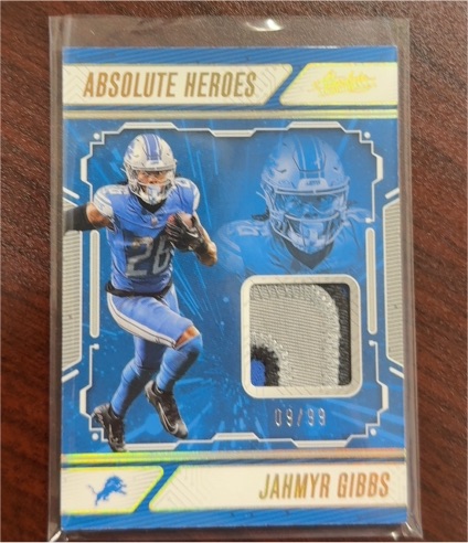 2024 Panini Absolute Absolute Heroes Memorabilia #AHM-JGB Jahmyr Gibbs — front