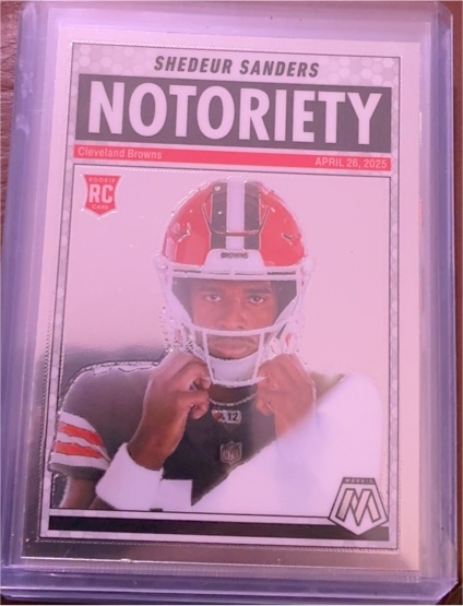 2025 Panini Mosaic #13 Shedeur Sanders Notoriety Orange Fluorescent Prizm — front