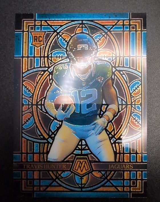 2025 Panini Mosaic #12 Travis Hunter — front