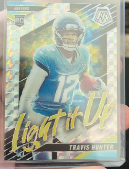 2025 Panini Mosaic Light It Up #LIU-TH Travis Hunter — front