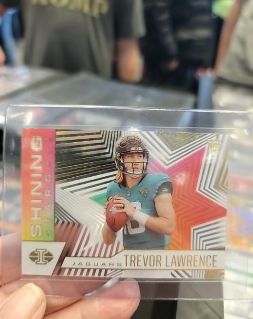 2021 Panini Illusions Shining Stars #SS-11 Trevor Lawrence — front