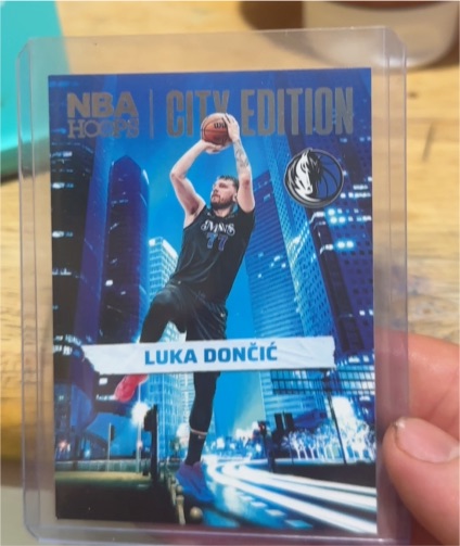 2024-25 Panini NBA Hoops City Edition #12 Luka Dončić — front
