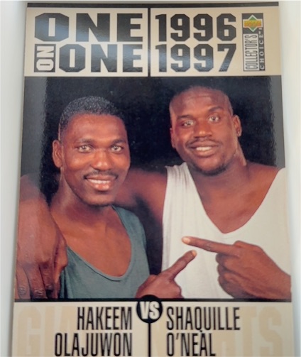 1996-97 Upper Deck Collector's Choice #357 Hakeem Olajuwon & Shaquille O'Neal One on One — front