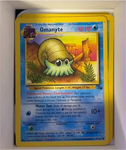 1999 Pokémon Fossil #52 Omanyte — front
