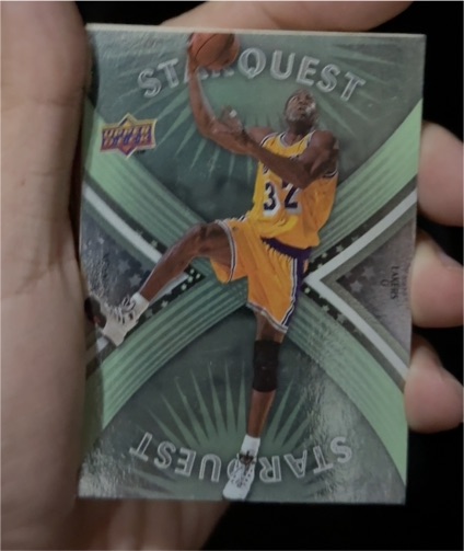 2008-09 Upper Deck First Edition #SQ-19 Magic Johnson StarQuest Green — front