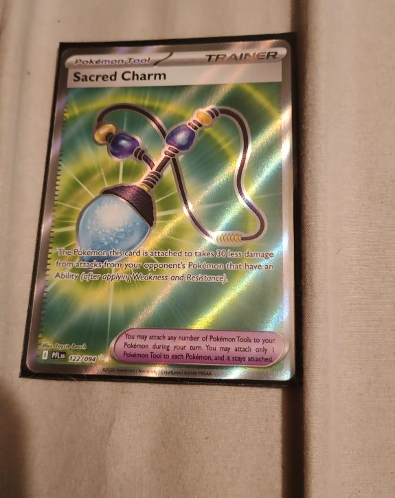 2023 Pokémon ME02: Phantasmal Flames #122 Sacred Charm — front