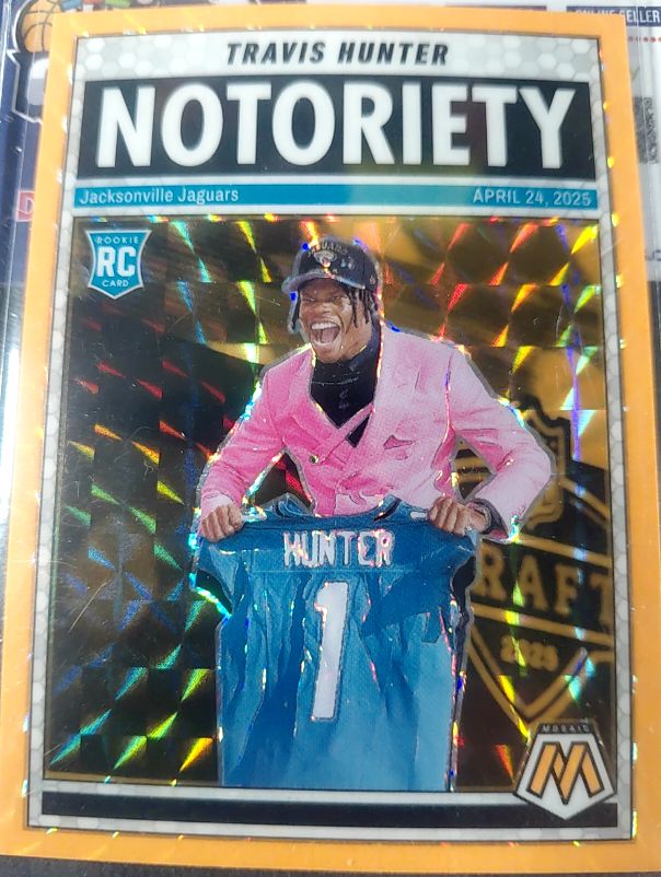 2025 Panini Mosaic Notoriety #12 Travis Hunter — front