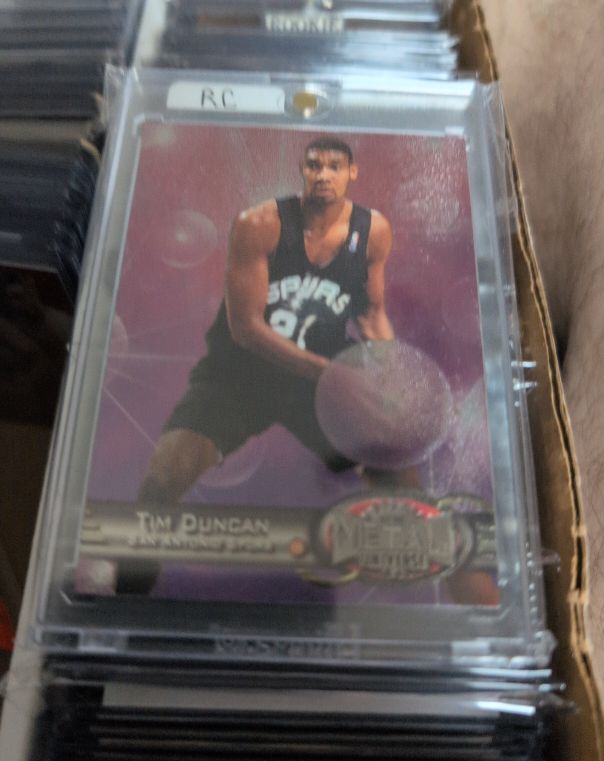 1997 Skybox Metal Universe #66 Tim Duncan — front