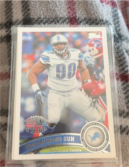 2011 Topps #104 Ndamukong Suh Rookie of the Year — front