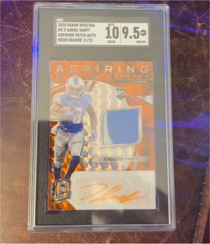 2020 Panini Spectra #5 D'Andre Swift Aspiring Patch Auto Neon Orange 11/15 — front