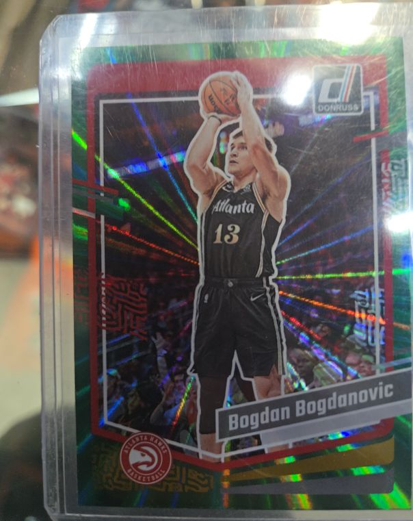 2023-24 Panini Donruss #147 Bogdan Bogdanovic Green Laser Hawks — front