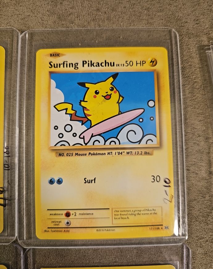 2016 Pokemon XY Evolutions #111 Surfing Pikachu — front