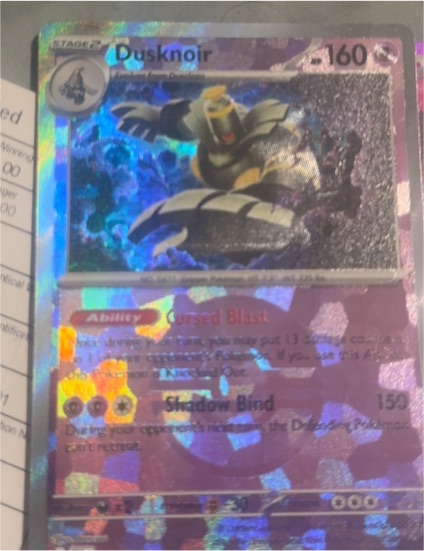 2024 Pokémon Prismatic Evolutions #037 Dusknoir — front