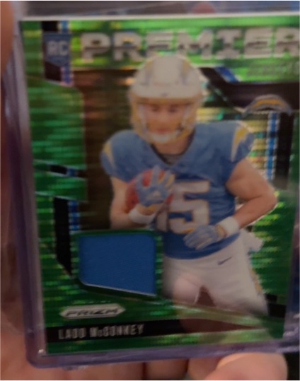 2024 Panini Prizm #PJ-LMY Ladd McConkey Premier Jerseys Neon Green Pulsar — front