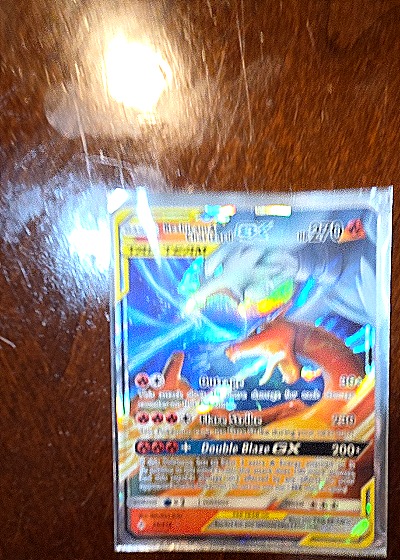 2019 Pokémon SM201 Reshiram & Charizard GX — front