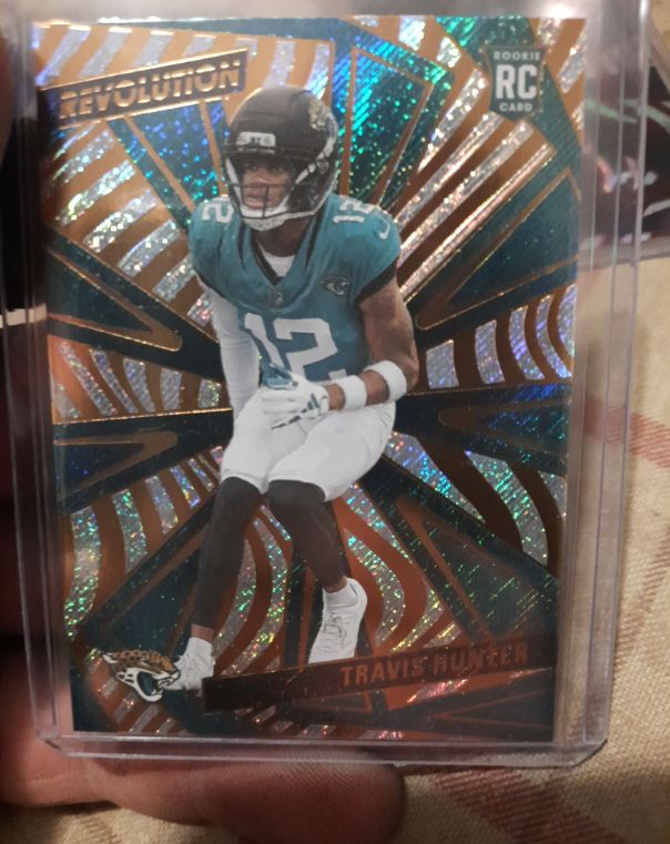 2025 Panini Revolution #242 Travis Hunter — front