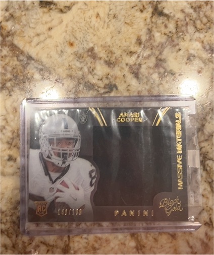 2015 Panini Black Gold Massive Materials Amari Cooper — front