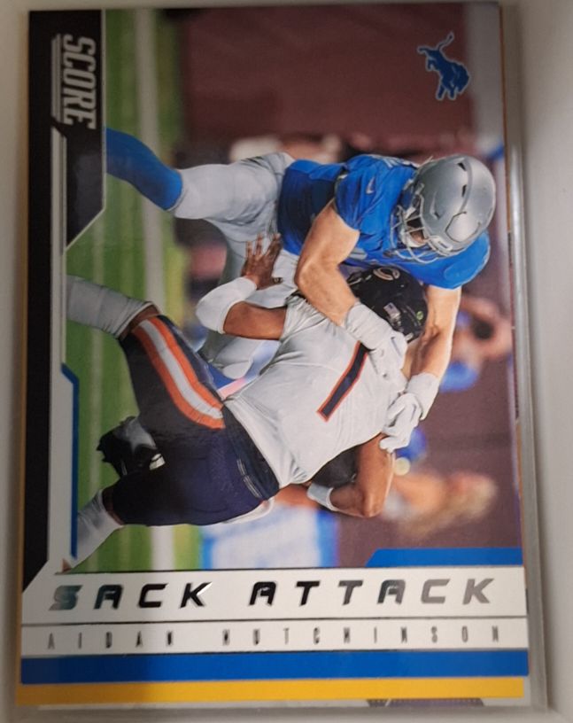 2023 Panini Score #12 Aidan Hutchinson Sack Attack — front